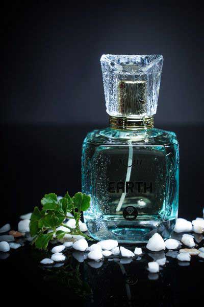 EARTH PERFUME WITH MUGUET ,MUSK AND WOOD